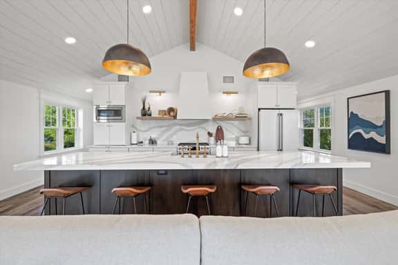 Gourmet kitchen with extra large island with ample serving space and seating for 5